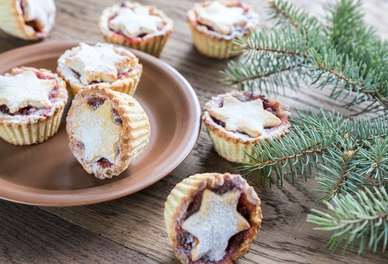 Mince pies with Christmas tree branch